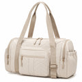 Sporttasche 45 x 25 x 25 cm aus Textil in Creme mit Steppmuster und mehreren Fächern